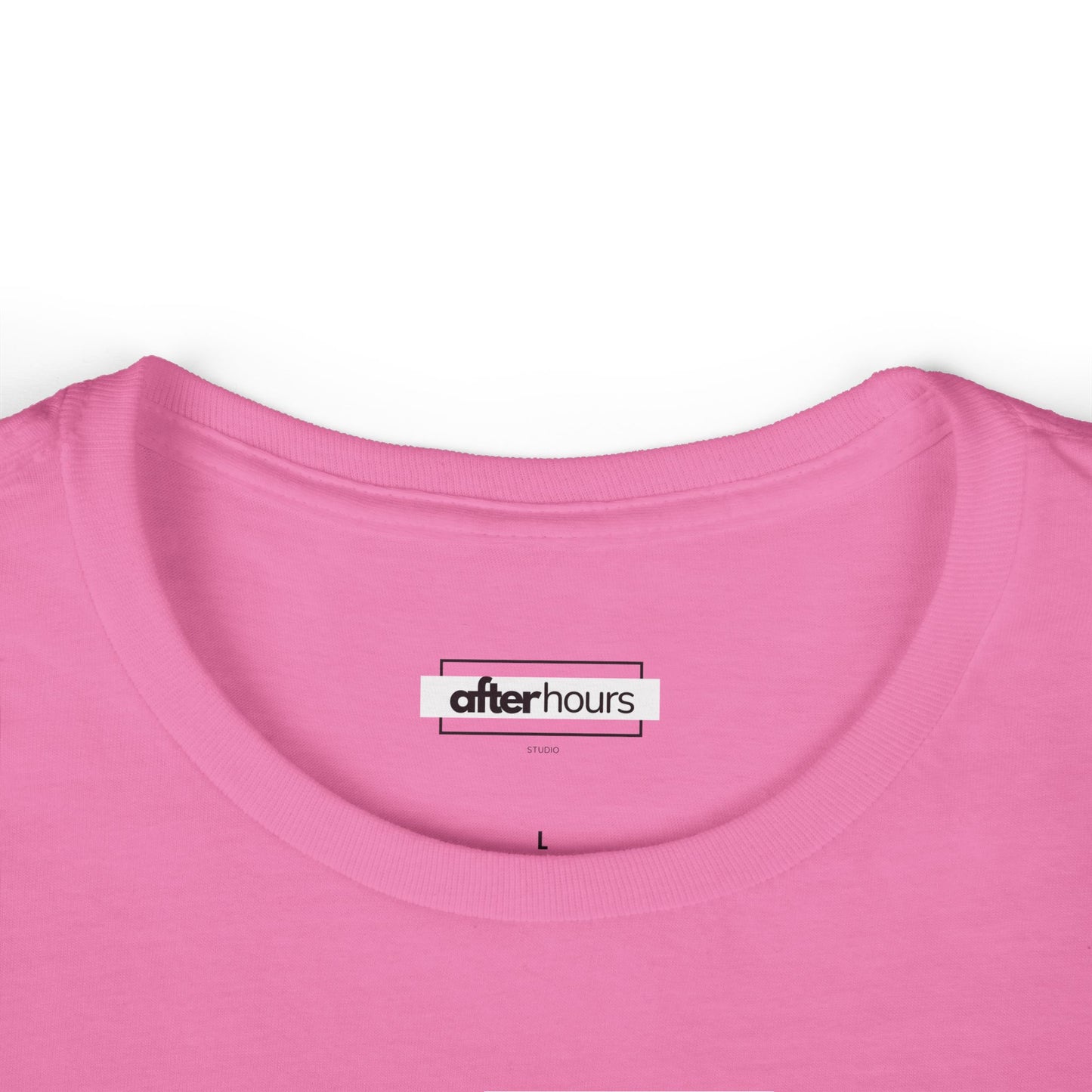 Close-up of a pink garment with 'after hours' label on a white background