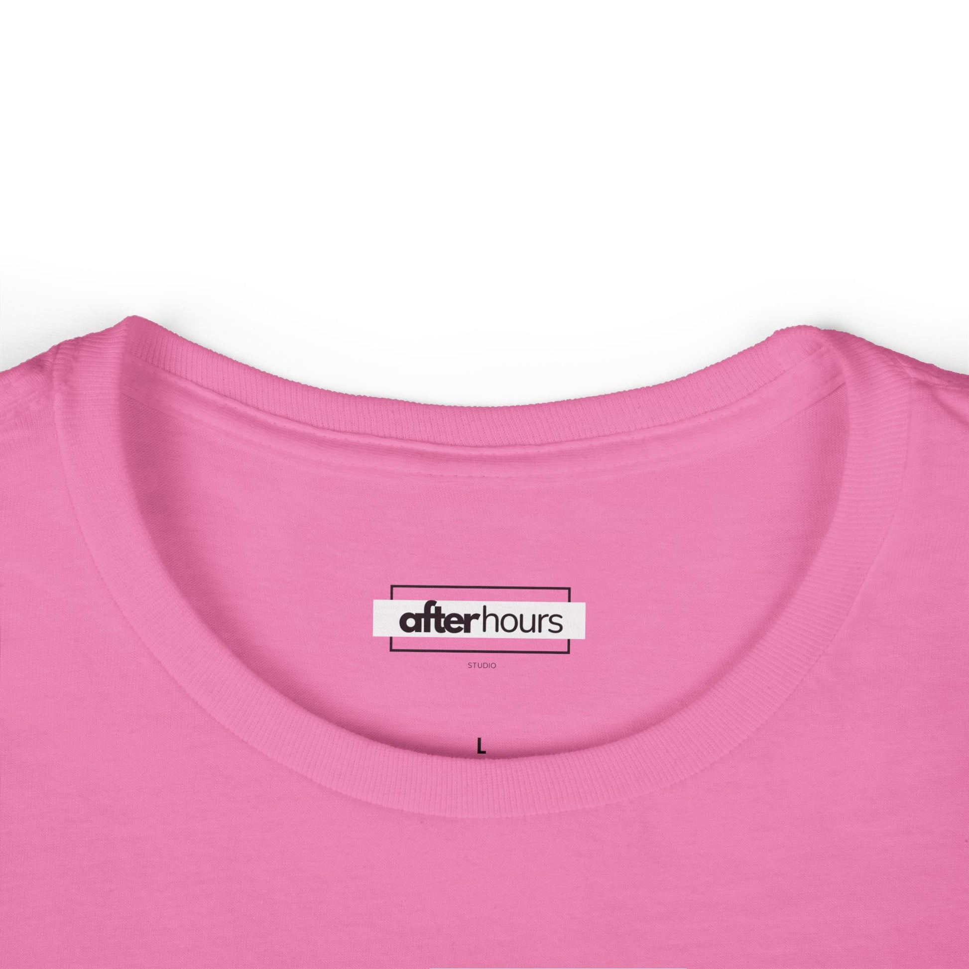 Close-up of a pink garment with 'after hours' label on a white background